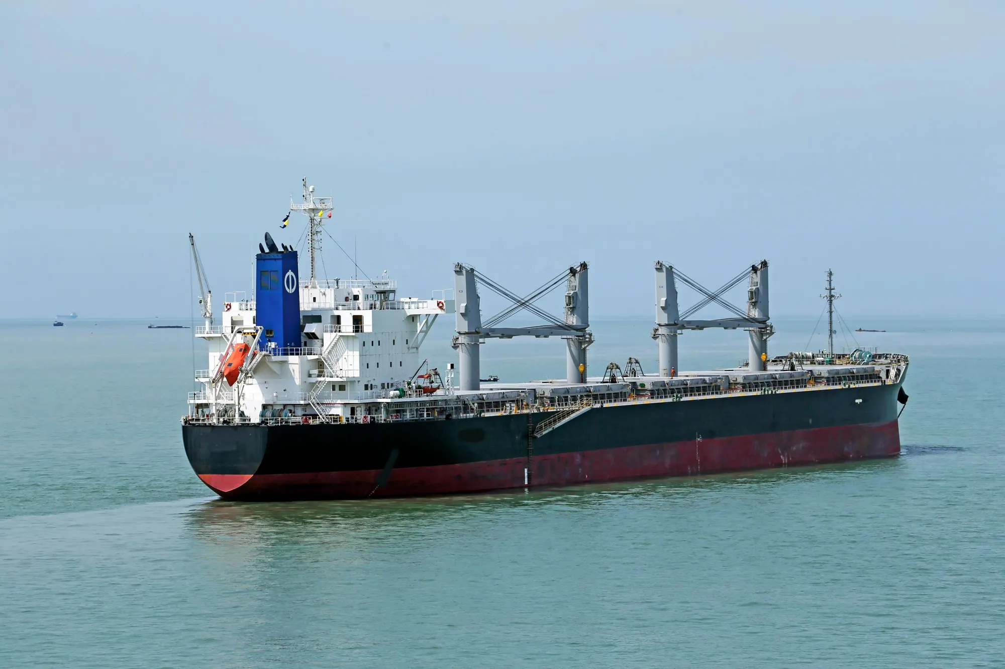 Bulk carrier under way in open sea